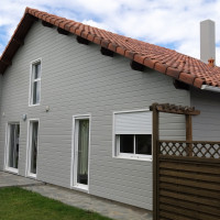 Peinture sur façade en bardage bois